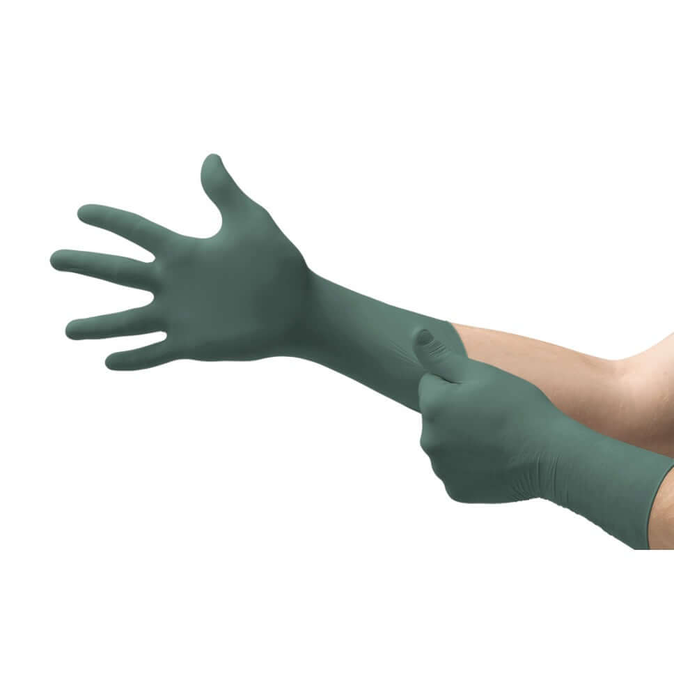 Person putting on Ansell Microflex DFK-608L Dura Flock lined green nitrile gloves